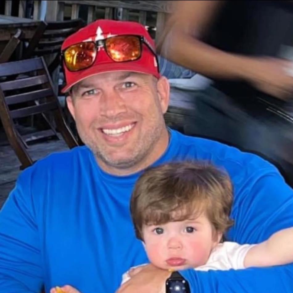 Michael Holt, Owner and President of Lone Star Roofing, with his family