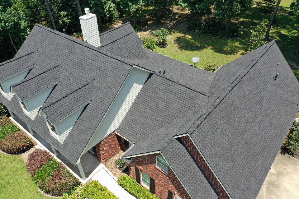 Completed asphalt shingle roof installation by Lone Star Roofing - Project 5