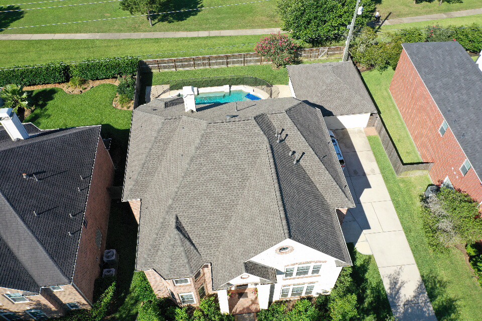 Completed asphalt shingle roof installation by Lone Star Roofing - Project 6