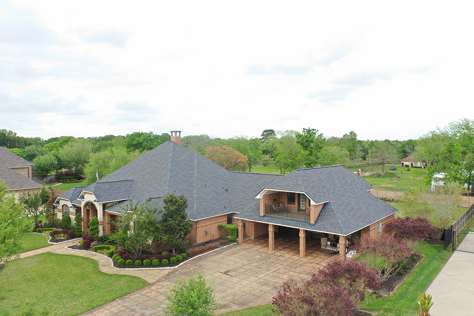 Completed asphalt shingle roof installation by Lone Star Roofing - Project 2
