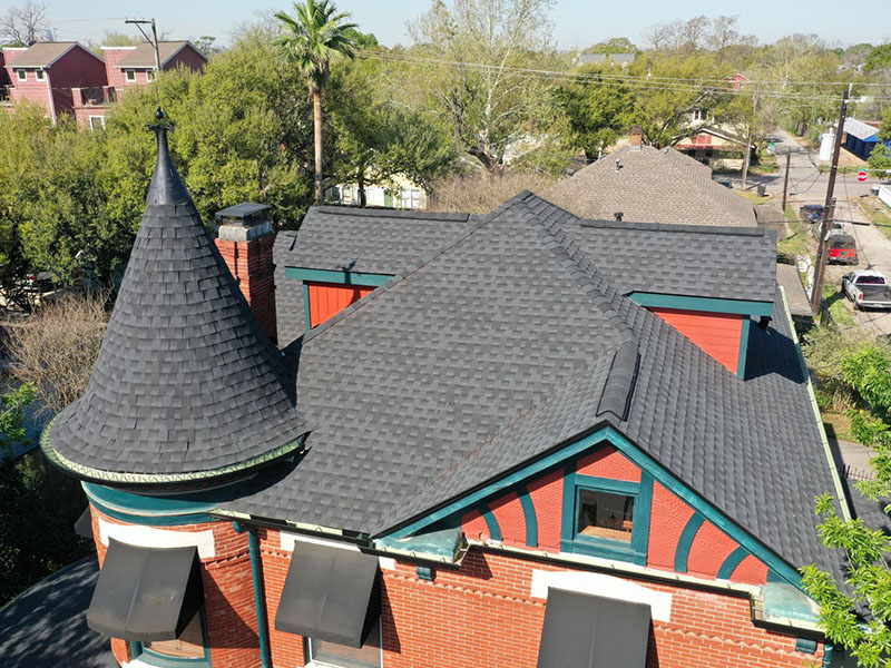 Close-up of a new charcoal asphalt shingle roof installed by Lone Star Roofing in Houston Texas